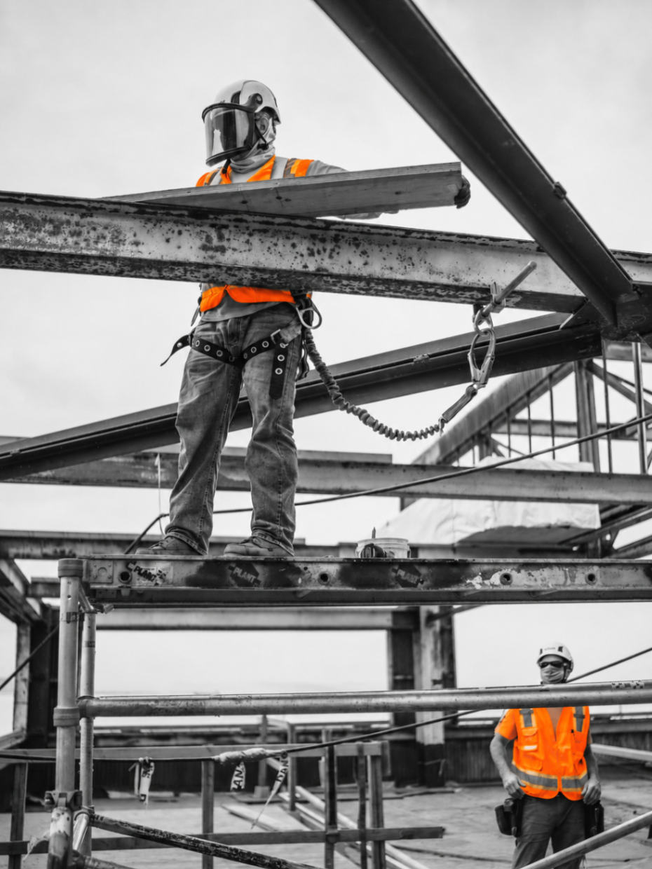 Worker on steel beam